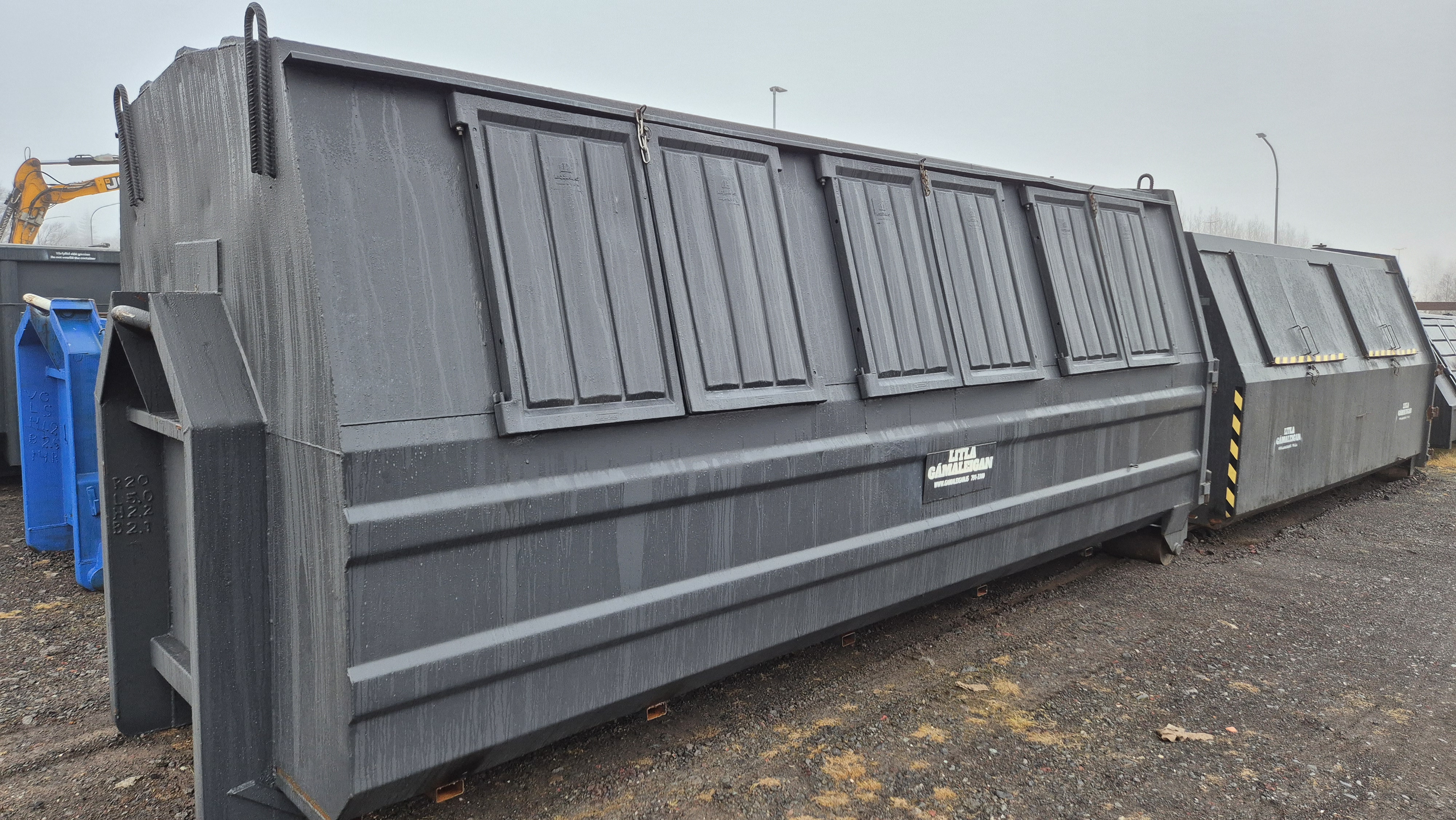 Lokaður krókheysigámur